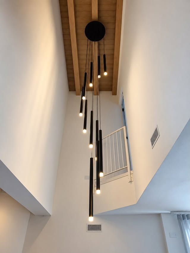 Bespoke pendant lighting for a double-height space